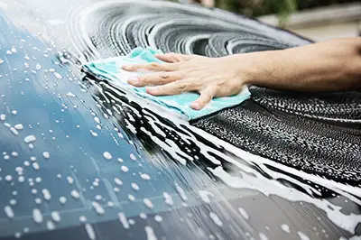 hand washing a car