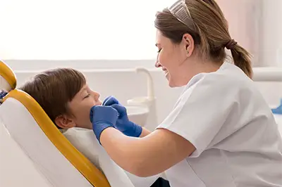 dentist with child patient